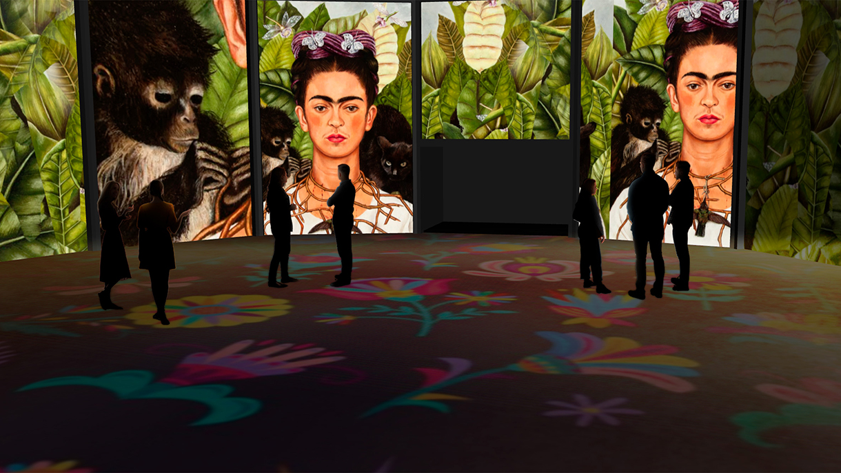 People viewing the Frida: Immersive Dreams display 